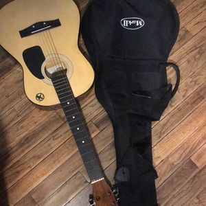 Acoustic student guitar.